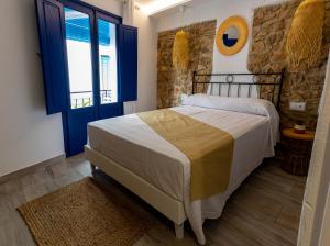 Posteľ alebo postele v izbe v ubytovaní Knysna Boutique Rooms