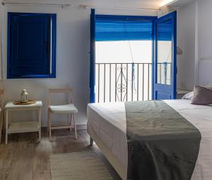 Posteľ alebo postele v izbe v ubytovaní Knysna Boutique Rooms