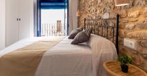 Posteľ alebo postele v izbe v ubytovaní Knysna Boutique Rooms