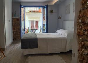 Posteľ alebo postele v izbe v ubytovaní Knysna Boutique Rooms