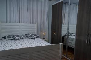Giường trong phòng chung tại Alto do Paraíso - Sítio em Gonçalves Sul de Minas- MG