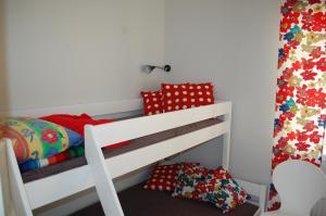 Postel nebo postele na pokoji v ubytování Grottstugan
