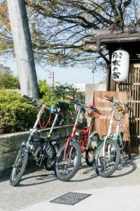 a group of three bikes parked next to each other at Entire House Popotel One in Matsumoto