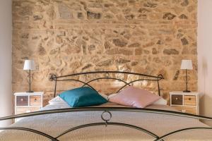 מיטה או מיטות בחדר ב-Appartamenti Monte Selce