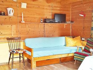 Et sittehjørne på One-Bedroom Holiday home in Vistdal