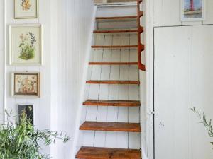 a staircase in a room with white walls at 6 person holiday home in LYSEKIL in Lysekil