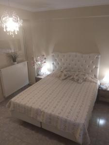 Katil atau katil-katil dalam bilik di Villa Elli