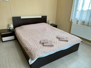 Ένα ή περισσότερα κρεβάτια σε δωμάτιο στο Sunny House Madjare Guest House
