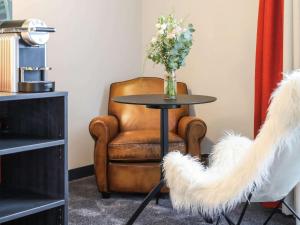 Posezení v ubytování ibis Styles Puteaux Paris La Defense