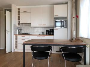 Kuchyň nebo kuchyňský kout v ubytování La Playa, Residence Deurloo 53-14