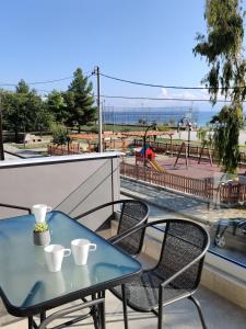 Balkón nebo terasa v ubytování Aelia Seaside Luxury Suites