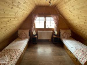 Кровать или кровати в номере Chata Wuja Toma