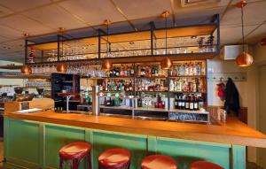 Loungen eller baren på Hotel Cafe Restaurant Van Den Hogen
