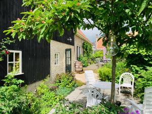 Zahrada ubytování het Binnenhuis