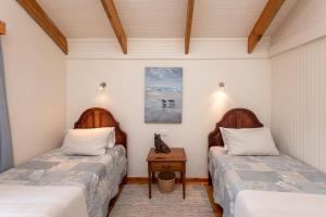 Ένα ή περισσότερα κρεβάτια σε δωμάτιο στο Kamma-Otter +71 φωτογραφίες