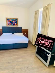 Katil atau katil-katil dalam bilik di Hotel Gamper