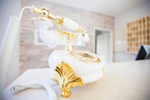 Ein Bett oder Betten in einem Zimmer der Unterkunft Hotel Krone OHG