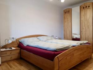 Postel nebo postele na pokoji v ubytování Bergblick Niedernsill