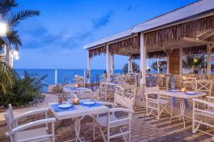 Un restaurant sau alt loc unde se poate mânca la Mari Kristin Beach Hotel