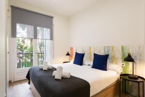 Posteľ alebo postele v izbe v ubytovaní Sitges Group Beach Dreams