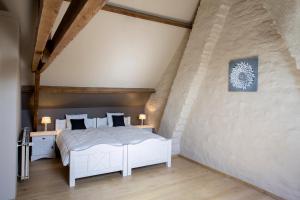 Postel nebo postele na pokoji v ubytování Holiday Home De Maalderij + 26 fotografií
