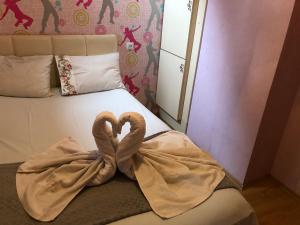 Postel nebo postele na pokoji v ubytování Aparment on Nano