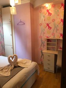 Postel nebo postele na pokoji v ubytování Aparment on Nano