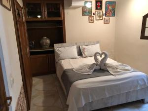 Postel nebo postele na pokoji v ubytování Aparment on Nano