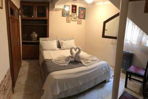 Postel nebo postele na pokoji v ubytování Aparment on Nano