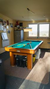 a ping pong table in a room with at Ferienhaus am Osterberg in Quedlinburg