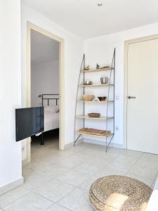 Et tv og/eller underholdning på Apartamentos Stella Maris