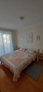 Postel nebo postele na pokoji v ubytování Apartament Viola