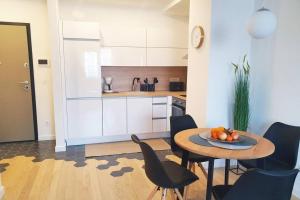 Kuchyňa alebo kuchynka v ubytovaní No.5 Apartment