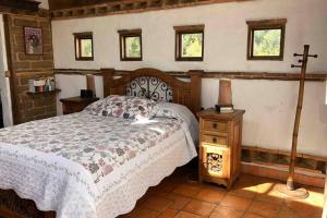 Giường trong phòng chung tại CASA VILLA SAN CARLOS