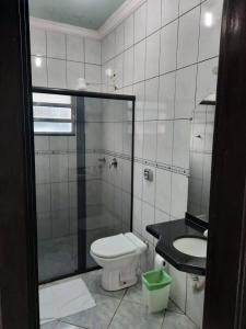 Um banheiro em Bravo City Hotel Nova Mutum