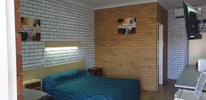 Glen Innes Lodge Motelにあるシーティングエリア