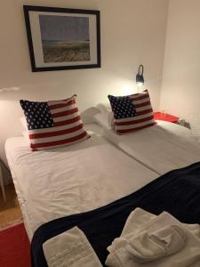 Postel nebo postele na pokoji v ubytování Hotell Kaprifol