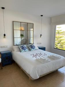Posteľ alebo postele v izbe v ubytovaní Apartamento en zona playa con vistas a la bahía