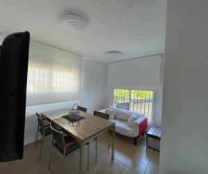 A seating area at Apartamento en zona playa con vistas a la bahía