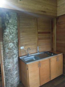 Foto Puerto Asíses asuva majutusasutuse Hostal Suna Vito galeriist