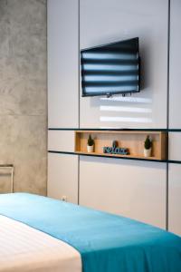Postel nebo postele na pokoji v ubytování Garni hotel King