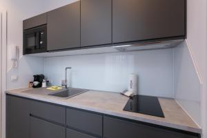 Kjøkken eller kjøkkenkrok på WF-Apartment zentral, trendig & modern, Westbahnhof