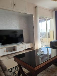 Télévision ou salle de divertissement dans l'établissement Appartement avec vue panoramique