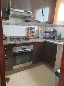 Cuisine ou kitchenette dans l'établissement Appartement avec vue panoramique
