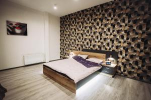 Llit o llits en una habitació de LOFT de luxe apartments