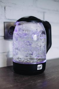 a food processor filled with water on a counter at LOFT de luxe apartments in Vinnytsya