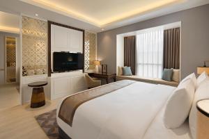 Televisyen dan/atau pusat hiburan di Sutasoma Hotel