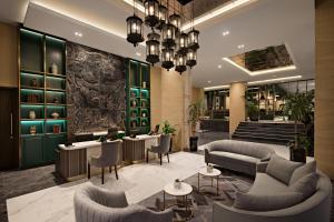 Posezení v ubytování Sutasoma Hotel