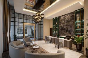 Posezení v ubytování Sutasoma Hotel