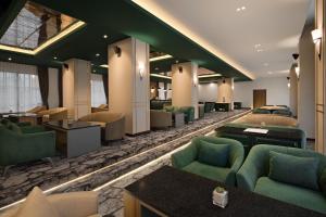 Posezení v ubytování Sutasoma Hotel